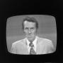 Thumbnail image of item number 1 in: '[Reporter on television]'.