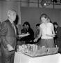 Photograph: [A man and a woman at an RTDNA conference]