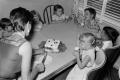 Photograph: [Pam and Byrd Williams IV enjoying ice cream at their birthday party]