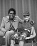 Photograph: [Charley Pride and a young child with MDS, 3]