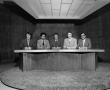 Photograph: [Photograph of the weekend news team and news set]