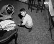 Photograph: [Photograph of Byrd Williams IV sitting on the floor]