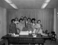 Photograph: [Curly Broyles with women and a cake]