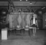 Photograph: [Unknown woman posing with a WBAP set]