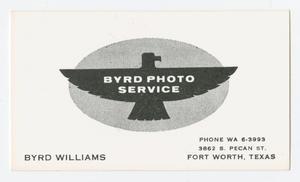 White card with a graphic of an eagle in the middle of it. The words Byrd Photo Service are on it.