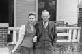 Photograph: [Photograph of Frances and Byrd Williams Jr posing in front of a hous…