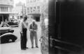 Photograph: [Photograph of two men in downtown Fort Worth]