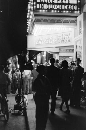 Primary view of object titled '[Photograph of individuals gathered in front of the Hollywood Theatre]'.
