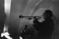 Photograph: [Photograph of a man playing a trumpet]