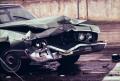 Photograph: [Wrecked front end of a car]