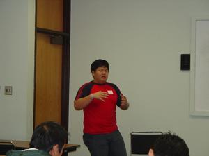 Primary view of object titled '[William Nguyen during presentation at APAEC]'.