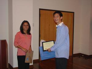 Primary view of object titled '[Clinton Chow receiving certificate at APAEC]'.