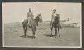 Photograph: [Two men on horseback]