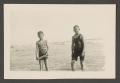 Photograph: [John and Byrd Williams, III, standing on a beach]