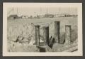 Photograph: [Construction site with posts in the ground]