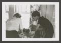 Photograph: [Doris and another woman preparing food]