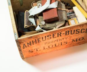 Primary view of [Family artifacts in an Anheuser-Busch crate]