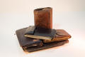 Photograph: [Pile of leather wallets]
