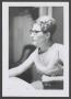Photograph: [Photograph of Doris Stiles Williams at a dining table, 2]