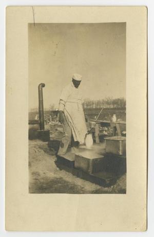 Primary view of object titled '[Postcard with unidentified cook]'.
