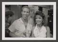 Photograph: [Photograph of Ken Silvia and a woman at an event]