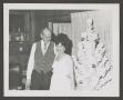 Photograph: [Photograph of Byrd III and Doris in front of a Christmas tree]
