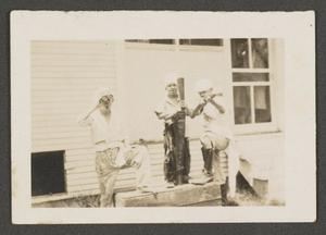 Primary view of object titled '[John, Charles, and Byrd Williams, III playing pirates]'.