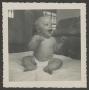 Photograph: [Photograph of baby Paul laughing]