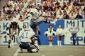 Photograph: [Dallas Cowboys player kicking a field goal]
