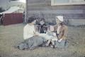 Photograph: [Doris, Byrd IV, Pam and Carol sitting outdoors]