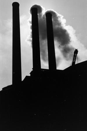 Primary view of object titled '[Silhouette of factory smokestacks]'.