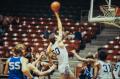 Photograph: [TCU basketball player in mid air]