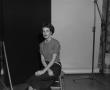 Primary view of [Doris sitting on a stool, in a studio, 4]