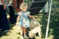 Photograph: [Young girl and a sheep]