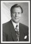 Photograph: [Photograph of a headshot of Mike Snyder in a suit]