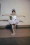 Photograph: [Young dancer in a purple leotard and tutu]