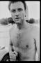 Photograph: [Portrait of shirtless man with scar on his chest]