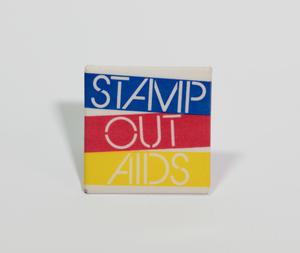 A square button, with the word Stamp Out Aids on it, one word on top of the other. Stamp is in a blue ribbon, Out in a red ribbon, and AIDS in a yellow ribbon.