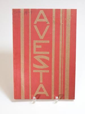 A page that is coral in color, and striped with gold lines. The middle of it says Avesta with the letters going downwards.