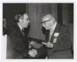 Thumbnail image of item number 1 in: '[Paul Kruse accepting a certificate from University President C.C. "Jitter" Nolen]'.
