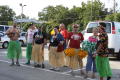 Thumbnail image of item number 1 in: '[Supporters in grass skirts at the second LSRFA pit-stop]'.