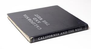 Black book, seen from the top and spine. The title is at the top of the front cover, and the title also expands the spine.
