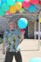 Photograph: [Supporter setting up balloons at LSRFA rest station]
