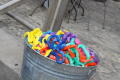 Photograph: [Bucket of colorful leis]