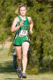 Photograph: [Runner at top of hill at North Texas Invitational]