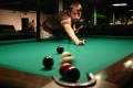 Photograph: [Student after making a shot in billiards game]