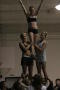 Photograph: [NT Cheer team practicing a two-tiered base]