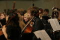 Photograph: [Students with cellos in orchestra]