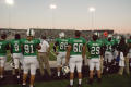 Thumbnail image of item number 1 in: '[Football team on sidelines during Homecoming game, 2007]'.
