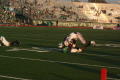 Photograph: [UNT player tackling FAU player, September 22, 2007]